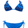 Blue bikini set with floral sequin appliqués on the cups and matching side-tie bottoms.