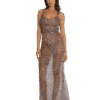 Full-length view of a woman modeling a brown leopard-print sleeveless maxi dress with thin straps, standing forward.