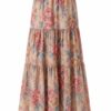 Floral maxi skirt with pink, peach, and blue flowers and tiered ruffles against a beige background.