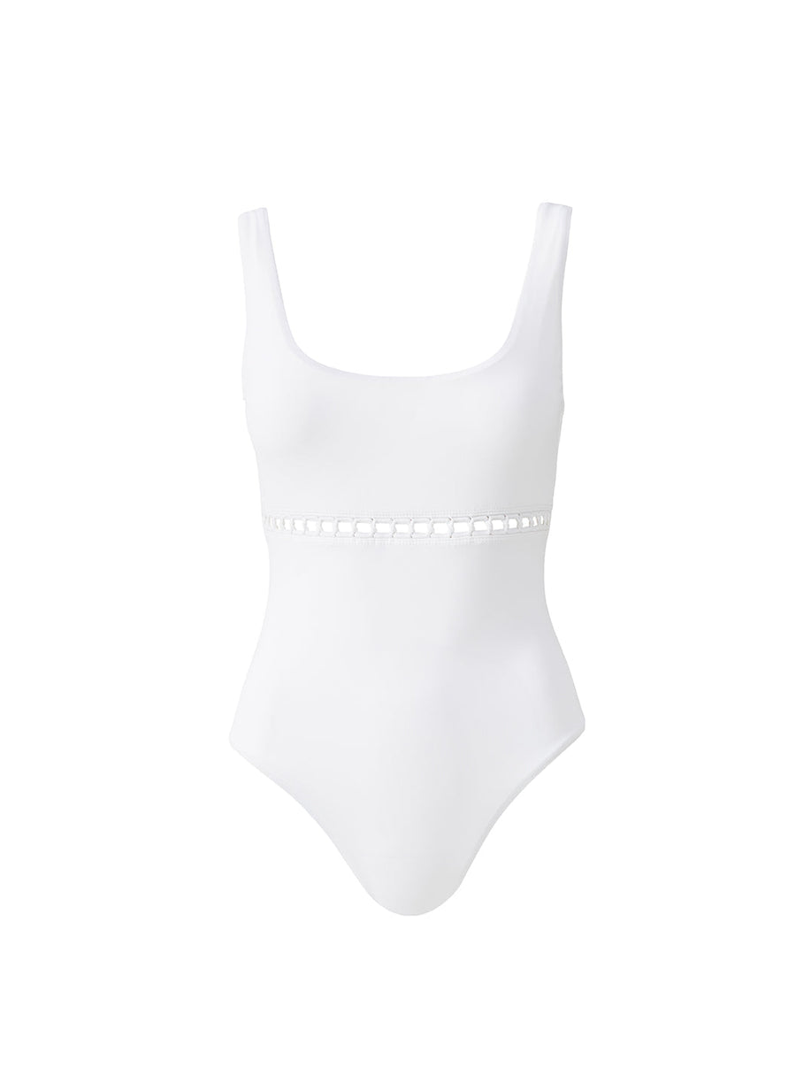 White one-piece swimsuit with a scoop neckline and a crochet waist band detail over the midsection.