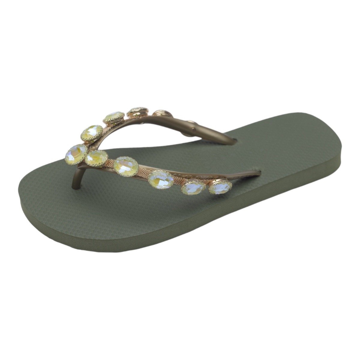 Green flip-flop sandal with a jeweled strap featuring iridescent stones