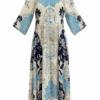 Cream maxi dress with a bold blue floral print and three-quarter sleeves, flowing silhouette.