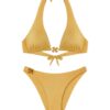 Mustard-yellow bikini set with a halter-top and string-toni bottom, featuring a small decorative floral charm at the center and on the hip area.