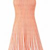 Orange-and-white striped, sleeveless, spaghetti-strap maxi dress with vertical pleats.